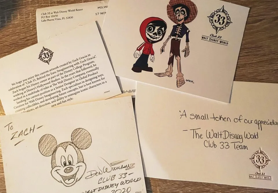 Club 33 Walt Disney World keepsakes — Zach’s custom Coco artwork of Miguel and Héctor with the event card
