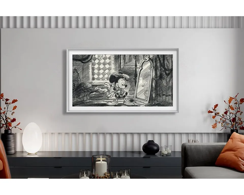 The Frame Disney100 showing Mickey artwork in a living room