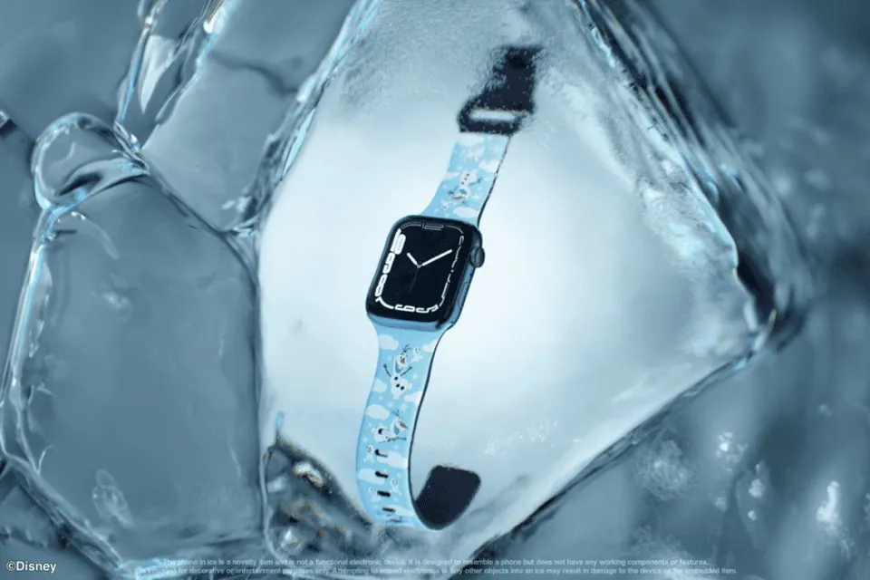 Frozen watch band suspended in sculpted ice