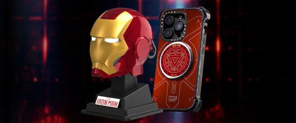 Iron Man helmet collectible beside an Arc Reactor case
