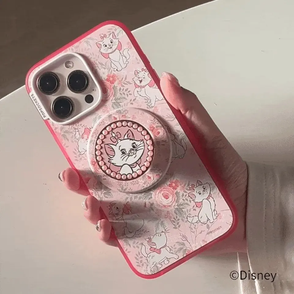 Marie floral case with pearl-framed Marie grip, in hand