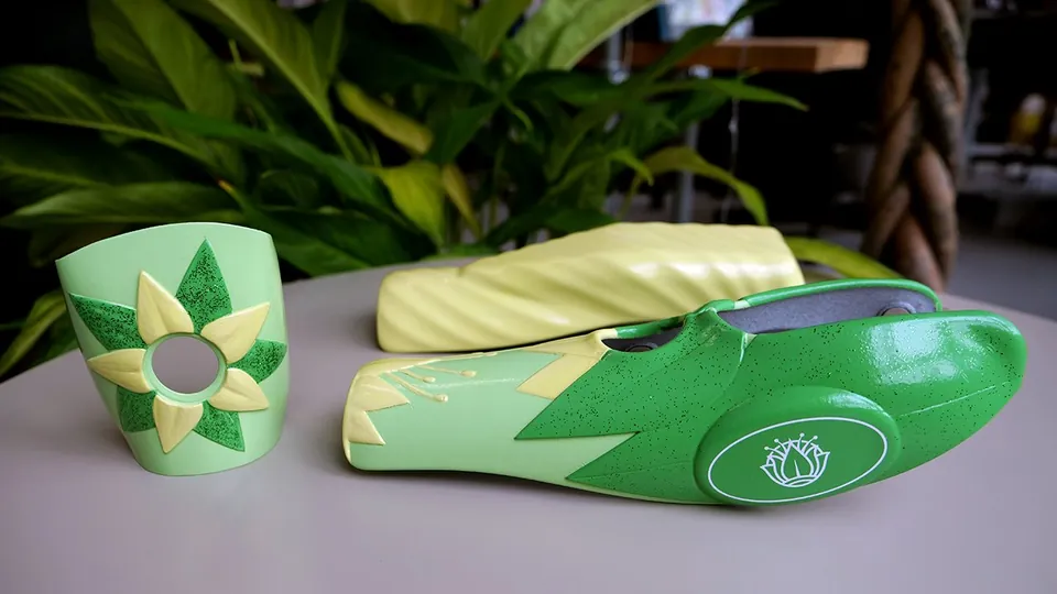 Tiana Hero Arm cover displayed — lily pad green with gold flower details