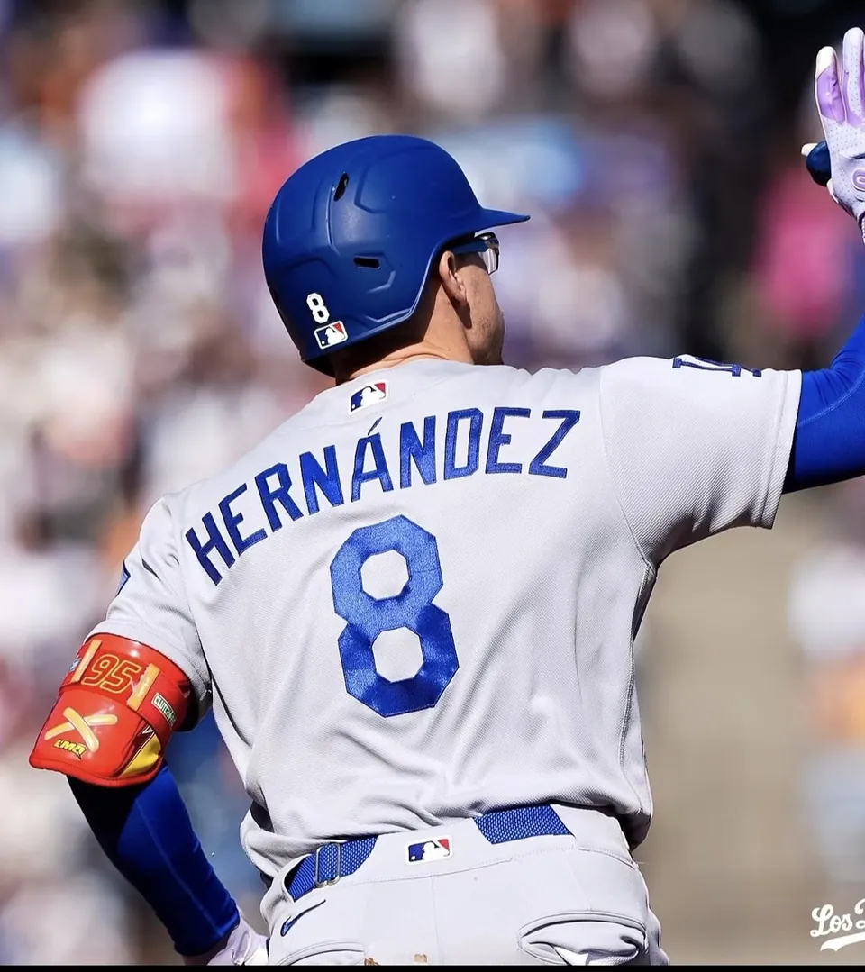 Los Angeles Dodgers number 8, Hernández, wearing the Lightning McQueen elbow guard